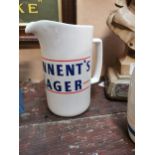 Tennants Lager Wade pottery ceramic advertising water jug. {15 cm H x 14 cm W x 9 cm D}.