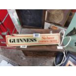 Guinness perspex advertising shelf light with slight damage. {8 cm H x 39 cm W x 5 cm D}.