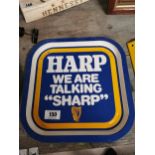 1950s Harp - We Are Talking Sharp advertising drinks tray {33 cm H x 33 cm W}.