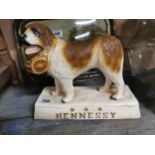 Hennessy Brandy plaster advertising model of Dog. {28 cm H x 31 cm W x 12 cm D}.