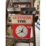 Guinness Time light up perspex and chrome advertising clock. {43 cm H x 35 cm W x 7 cm D}.