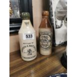 Two Ginger Beer bottles – A Watt Londonderry and Ballymena. { 20 cm H x 7 cm Dia}.
