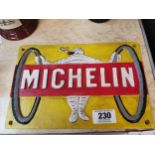 Michelin Tyre Man cast iron advertising plaque . {20 cm H x 30 cm W}.