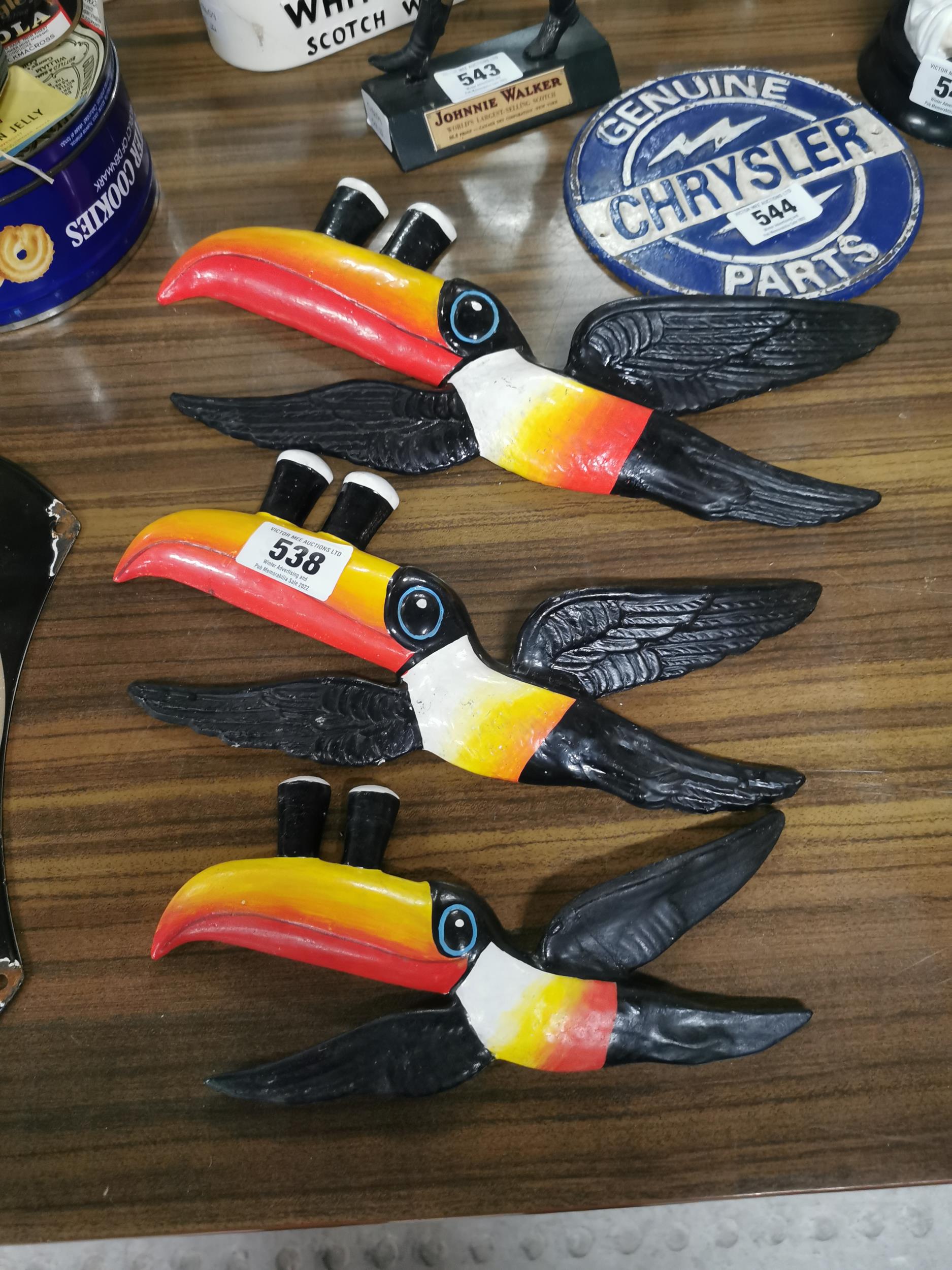 Set of three resin Guinness Flying Toucans. {18 cm H x 40 cm W} to {12 cm H x 16 cm W}.