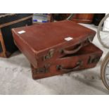 Two Leather suitcases. {9 cm H x 45 cm W x 29 cm D}
