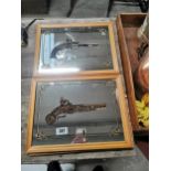 Three framed mirrors depicting Revolvers. {32 cm H x 43 cm W}.