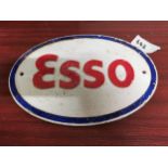 Esso cast iron advertising plaque. {23 cm H x 32 cm W}.