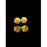 Gold cufflinks