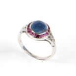 White gold ring with diamonds, rubies and sapphires