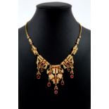 Gold necklace with pearls and rubies