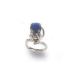 White gold ring with diamonds and blue opal