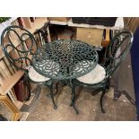 BOTTLE GREEN WROUGHT IRON PATIO TABLE AND TWO CHAIRS