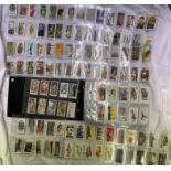 ALBUM OF MIXED COLLECTIBLE CARDS INCLUDING TEA, CIGARETTE,