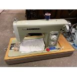 BROTHER CASED ELECTRIC SEWING MACHINE WITH TREADLE