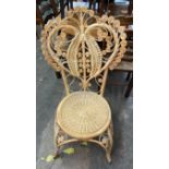 ORNATE BAMBOO AND SEAGRASS HEART SHAPED BACK CHAIR