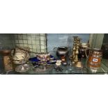 SHELF OF METAL WARES INCLUDING BRASS CANDLE STICKS, TIN BASKET, STEINS, BELL,