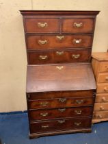 MID 18TH CENTURY OAK BUREAU CHEST WITH A FITTED STEPPED INTERIOR