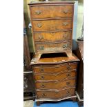 REPRODUCTION WALNUT CROSS BANDED SERPENTINE CHEST OF FOUR DRAWERS WITH BRUSHING SLIDE AND A SMALLER