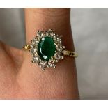 YELLOW GOLD STAMPED 750 EMERALD AND DIAMOND CLUSTER RING SIZE S/T 5.