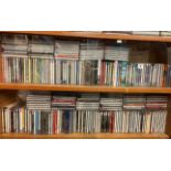FOUR SHELVES OF CD MUSIC MAINLY CLASSICAL AND OPERETTA