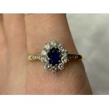 YELLOW GOLD STAMP 750 SAPPHIRE AND DIAMOND CLUSTER RING SIZE V 4.