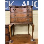 WALNUT SERPENTINE THREE DRAWER CHEST ON CABRIOLE LEGS