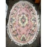 CHINESE PINK PATTERNED OVAL RUG