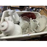 TWO CRATES OF POTTERY PLATES, TEAPOTS, DECORATIVE RED CHARGER PLATES, GLASS DECANTER,