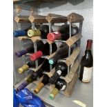 SELECTION OF BOTTLED WINES IN WINE RACK INCLUDING CHATEAUNEUF DU PAPE