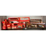 SHELF OF BOXED MODEL RAILWAY HORNBY 00 SCALE CARRIAGES AND WAGONS,