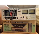 VHS VIDEO PLAYER AND A VINTAGE TECHNICS STEREO CASSETTE DECK 615