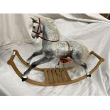 MODEL OF A DAPPLE GREY TOY ROCKING HORSE