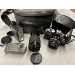 CASED OLYMPUS OM10 35MM CAMERA AND ACCESSORIES AND LENS AND A SONY CYBER SHOT CAMERA