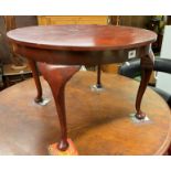 CIRCULAR OCCASIONAL TABLE ON CABRIOLE LEGS