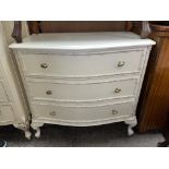 CREAM AND GILDED FRENCH STYLE SERPENTINE THREE DRAWER CHEST