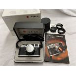 CASED LEICA M6 CAMERA WITH LENS AND POUCH