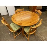 PINE CIRCULAR KITCHEN BREAKFAST TABLE AND FOUR SPINDLE RAIL BACK CHAIRS