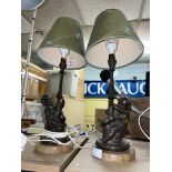 PAIR OF BRONZE CHERUB SPIRAL TWIST TABLE LAMPS ON MARBLED BASES