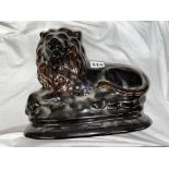 STAFFORDSHIRE TREACLE GLAZED RECUMBENT LION