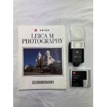 LEICA SF20 FLASH AND A FILTER WITH SPARE FILTER PLASTIC CASE,