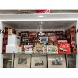 SHELF OF BOXED MODELS OF YESTERYEAR,