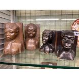 TWO PAIRS OF AFRICAN CARVED HARD WOOD PORTRAIT BOOK ENDS