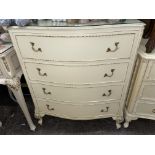 CREAM AND GILDED FRENCH STYLE SERPENTINE FOUR DRAWER CHEST