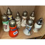 SHELF OF BALUSTER SIFTERS BY ROYAL VENTON, BURSLEM POTTERY,