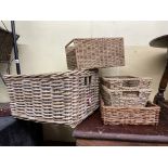 SELECTION OF WICKER AND SEAGRASS BASKETS AND THREE HANGING CANDLE LANTERNS