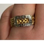 9CT YELLOW AND WHITE GOLD FLAT CURB LINK BUCKLE RING SIZE O/P 2.