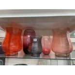 SHELF OF OCTAGONAL RIBBED GLASS AND OTHER GLASS VASES