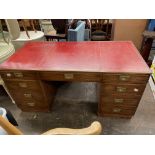 GOOD QUALITY MAHOGANY KNEEHOLE DESK WITH BRASS MILITARY MOUNTS AND RED LEATHER GILDED TOP H- 75CM
