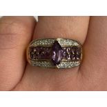 9CT GOLD AMETHYST MARQUISE STONE SET BROAD BAND SIZE O, 3.