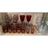 SHELF OF AMETHYST AND RUBY DRINKING GLASSES